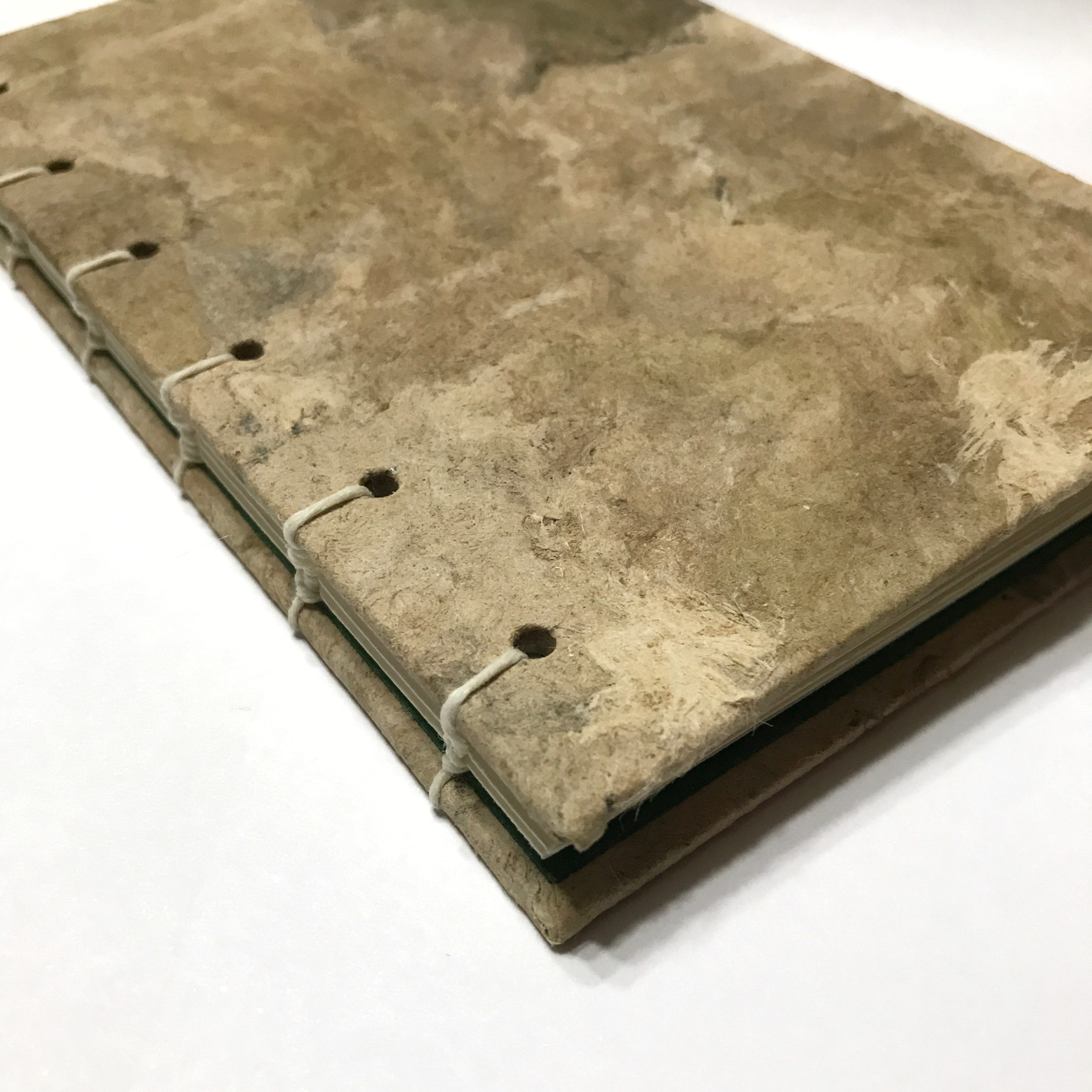 Closeup of cover of natural bark cover sketchbook